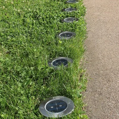 Sunnydaze Decor Sunnydaze Outdoor Landscape Driveway Solar Powered Garden Pathway Ground Stake Bright White LED Lights - 24pk 4 Sunnydaze Decor Sunnydaze Outdoor Landscape Driveway Solar Powered Garden Pathway Ground Stake Bright White LED Lights - 24pk - Image 2