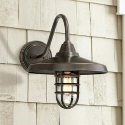 John Timberland Industrial Outdoor Barn Light Wall Fixture Painted Bronze Cage 16 3/4" Clear Glass for Exterior House Porch Patio